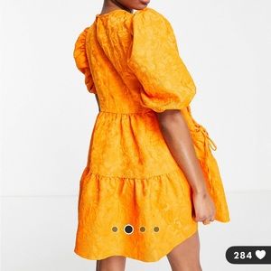 ASOS DESIGN Petite jacquard tiered mini dress with bellow pockets in pop orange